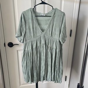 Light green V neck dress with pockets